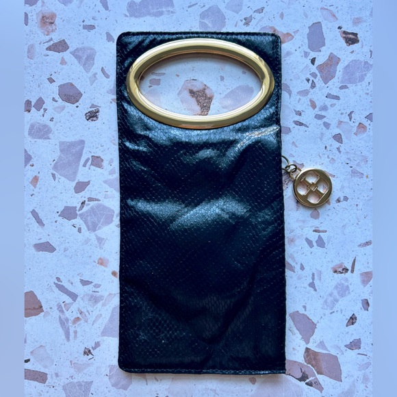 IMAN Black and Gold Clutch - Picture 1 of 5